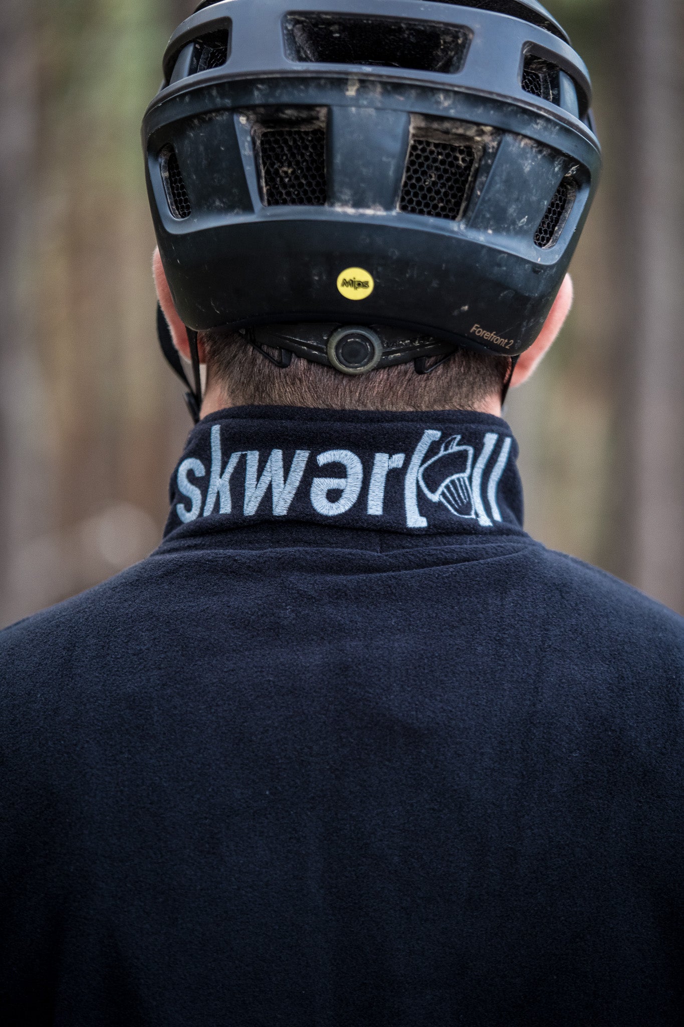 MTB Rider with Skwerel Fleece Logo Print reflective
